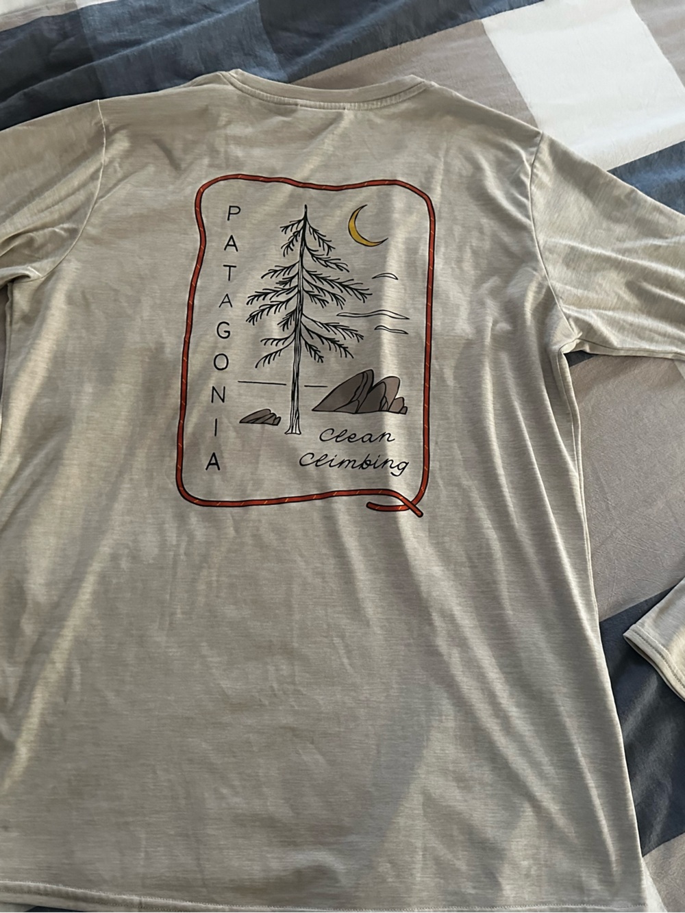 Patagonia Light Beige Long-Sleeve Graphic Tee with Red Accents